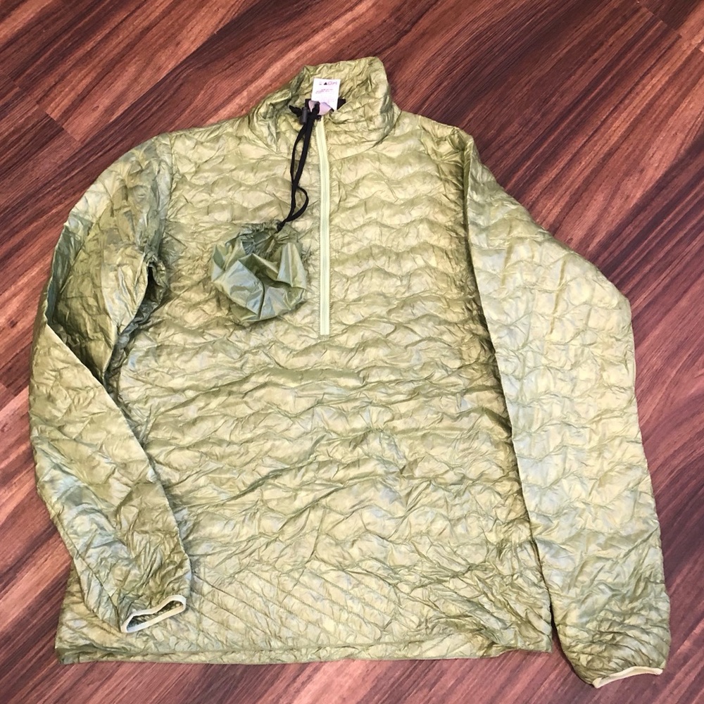 Patagonia jacket. Down filled which makes it light but warm.